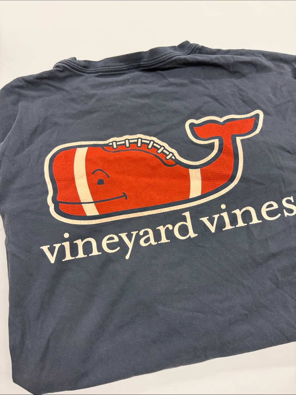 Vineyard Vines Navy Tee with football Whale Graphic